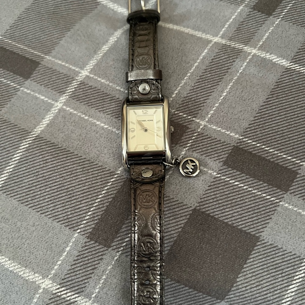 *Rare Michael Kors Grey Silvertone Watch with charm.